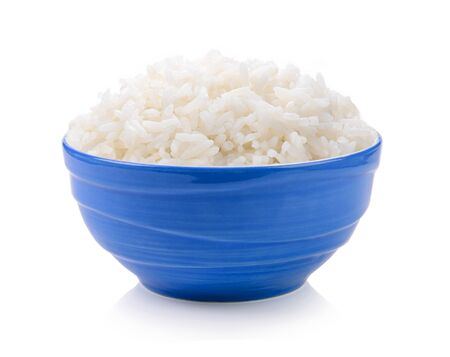 rice in blue bowl on white backgroundの写真素材