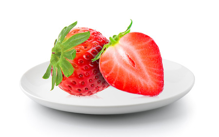 Strawberry in plate isolated on a white backgroundの写真素材