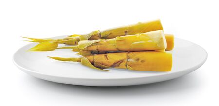 Bamboo shoot in plate isolated on a white backgroundの写真素材