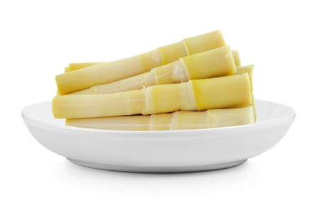 Bamboo shoot in plate on white backgroundの写真素材