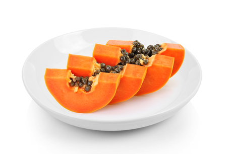 papaya slice in plate on white backgroundの写真素材