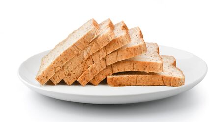 sliced bread in plate isolated on a white backgroundの写真素材