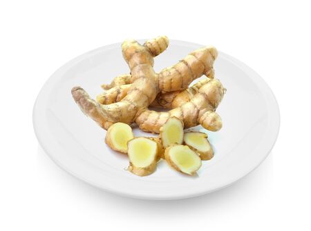 white turmeric in plate on white backgroundの写真素材