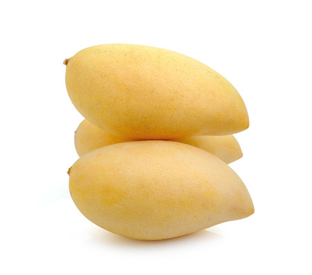 ripe mango isolated on white backgroundの写真素材