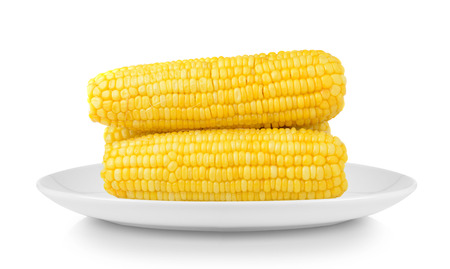 corn in plate isolated on white backgroundの写真素材
