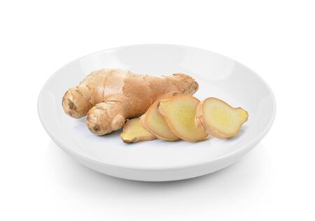 ginger in plate on white backgroundの写真素材