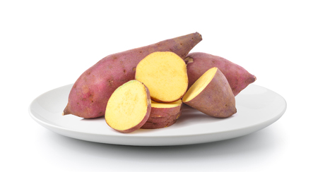 sweet potato in plate isolated on a white backgroundの写真素材