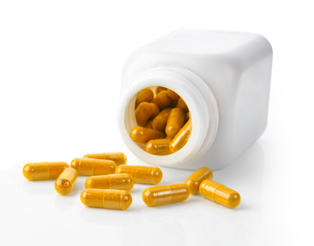 Turmeric Capsule on white backgroundの写真素材