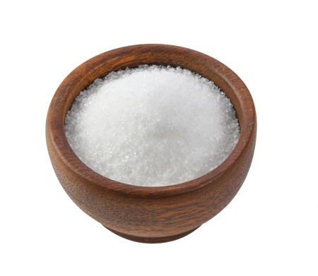 white sugar in wood bowl on white backgroundの写真素材