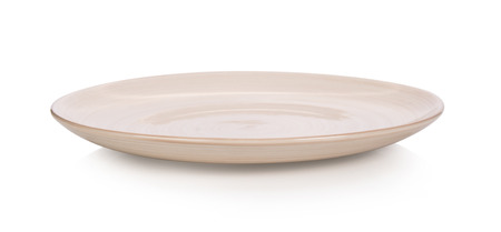 Empty plate on white backgroundの写真素材
