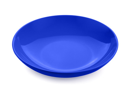 empty red plate isolated on white backgroundの写真素材