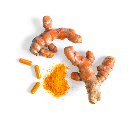 turmeric and capsule isolated on white backgroundの写真素材