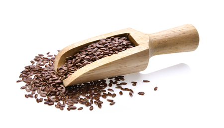 Flax seeds heap on white backgroundの写真素材