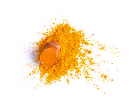 Turmeric (Curcuma) powder pile isolated on white background, top viewの写真素材