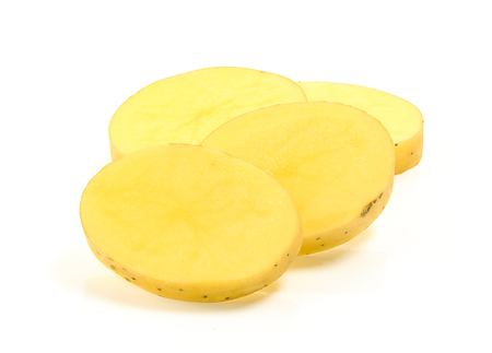 Potato slice isolated on white backgroundの写真素材