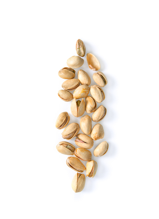 Pistachios isolated on white background, top view.の写真素材