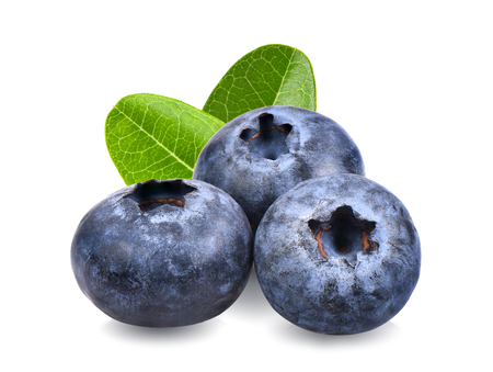 Blueberries with green leaves closeup, isolated on white backgroundの写真素材