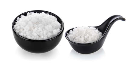 salt in a bowl isolated on white backgroundの写真素材
