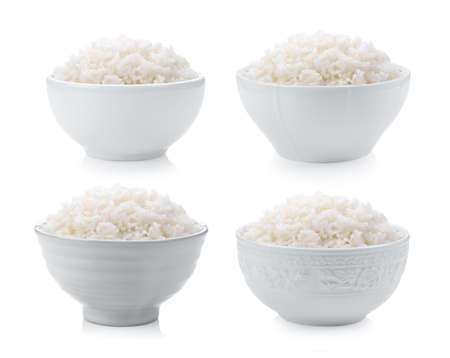 rice in white bowl isolated on white backgroundの写真素材
