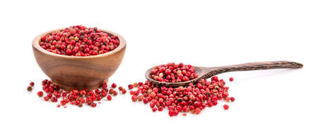 dried pink peppers isolated on white backgroundの写真素材