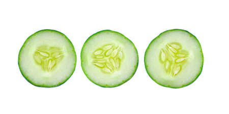 Fresh sliced cucumber isolated on white backgroundの写真素材