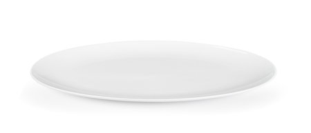 white seramic plate isolated on white backgroundの写真素材