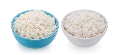 Rice in a bowl isolated on white backgroundの写真素材