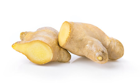 fresh ginger isolated on white backgroundの写真素材