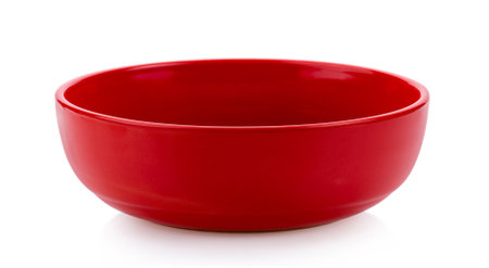 red ceramic bowl isolated on white backgroundの写真素材