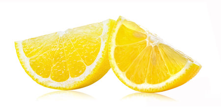 Slice of lemon fruit isolated on white backgroundの写真素材
