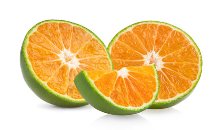 green orange tangerine slice isolated on white backgroundの写真素材