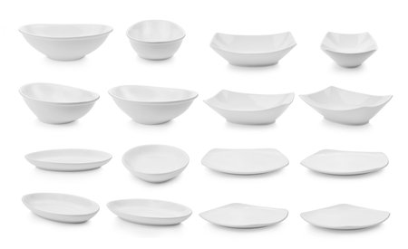 empty ceramic bowl and plate isolated on white backgroundの写真素材