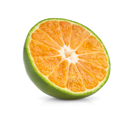 green orange tangerine slice isolated on white backgroundの写真素材