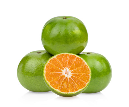 green orange tangerine isolated on white backgroundの写真素材