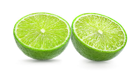 Juicy slice of lime isolated on white backgroundの写真素材