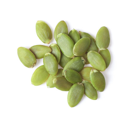 Pumpkin seeds isolated on white, top viewの写真素材