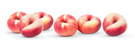 flat donut peaches isolated on white backgroundの写真素材