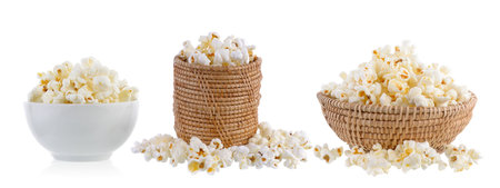 popcorn in basket and bowl isolated on white backgroundの写真素材