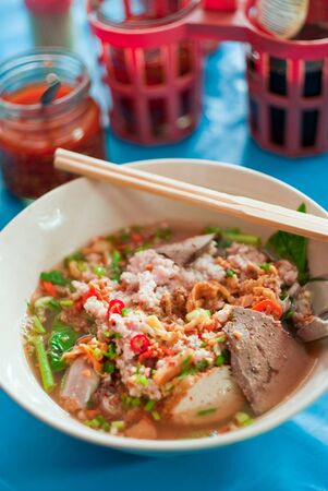 Pork noodle soup with seasoningの写真素材