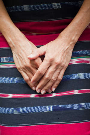 Hands and sarong の写真素材