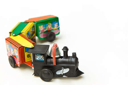 Toy trains on white background
