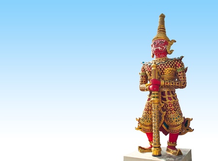 Red giant statue in the temple の写真素材