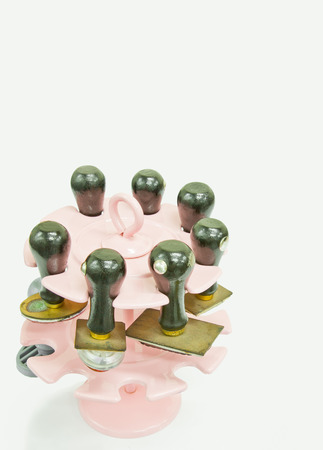 Rubber stamps in pink hangingの写真素材