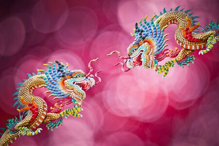 Chinese dragons isolated on red
