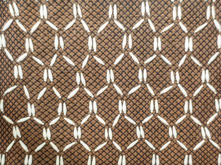 Brown fabric striped seamless pattern and beads