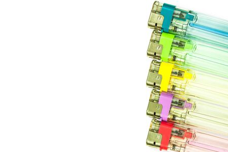 Colorful gas lighters isolated on whiteの写真素材