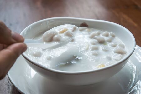 Thai desserts, Made of rice and some fruit with in coconut creamの写真素材