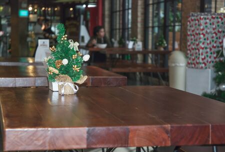 Mini Christmas Tree on Tableの写真素材