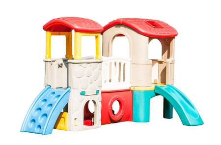 Toy house on a green lawnの写真素材