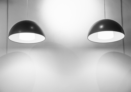 Warm lighting from red lamps on ceilingの写真素材